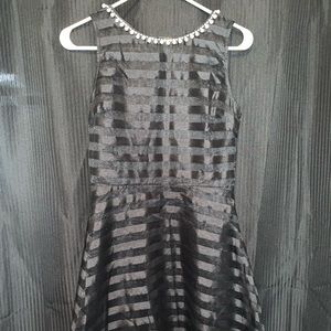 Black skater dress with pearl detailing